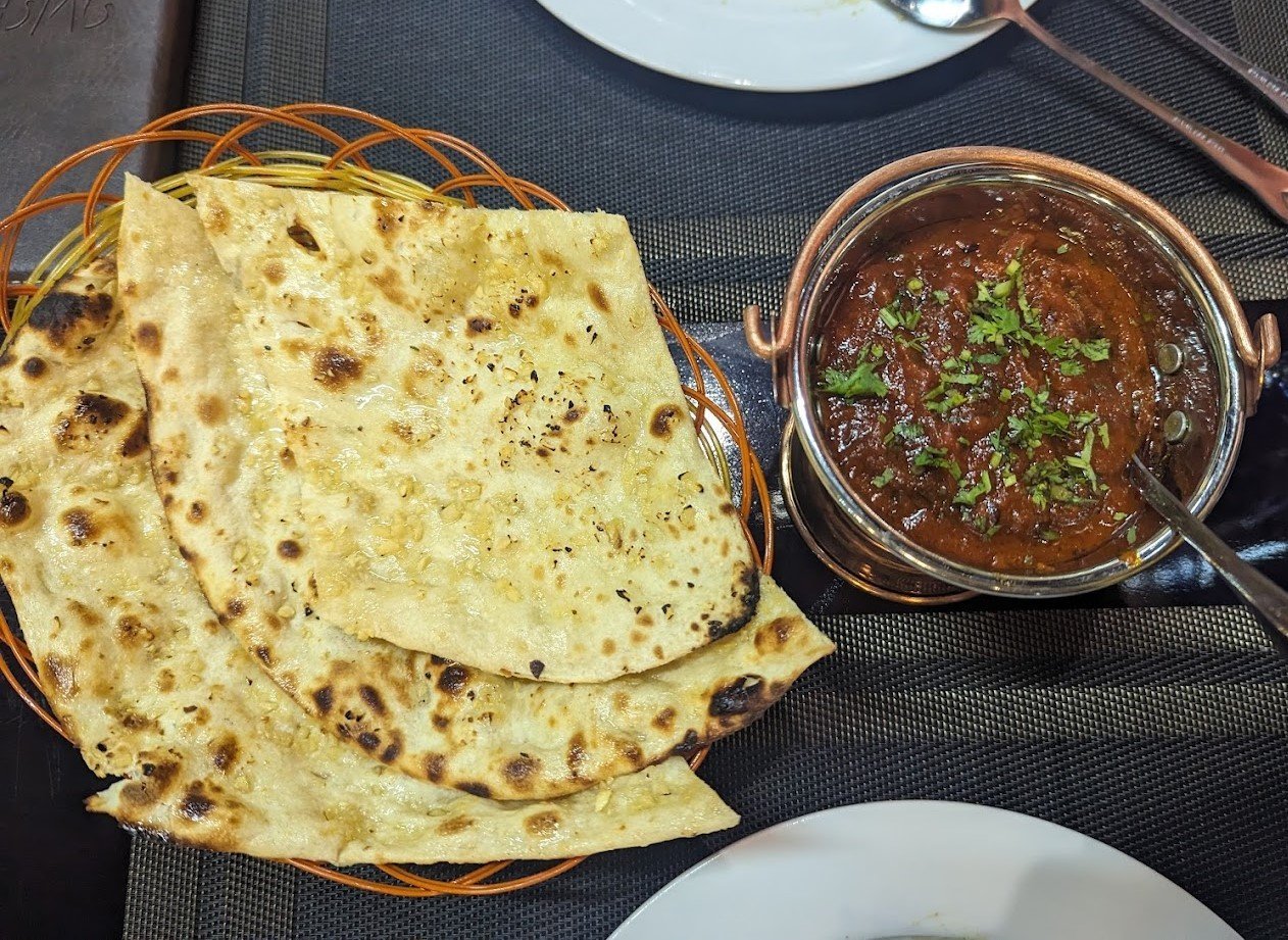 Fresh Indian breads and curry at Kadhai