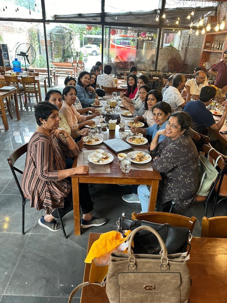 Guests gathered around the table at Kadhai